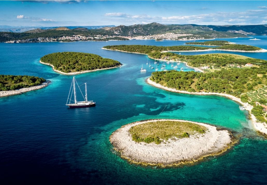 Aerial view of Paklinski Islands in Hvar, Croatia. Turquise water bays with luxury yachts and sailing boats. 