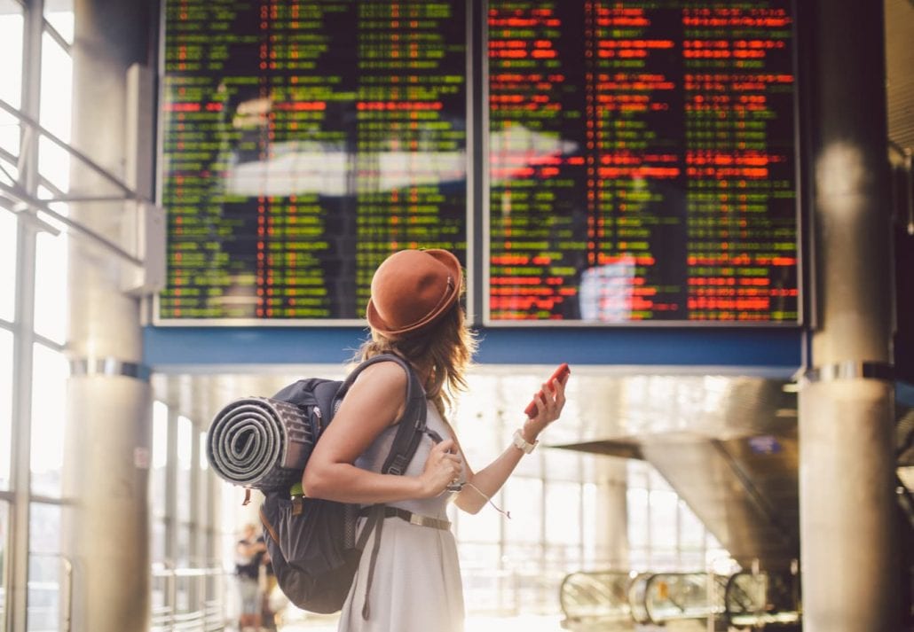 Solo woman traveler at the airport.