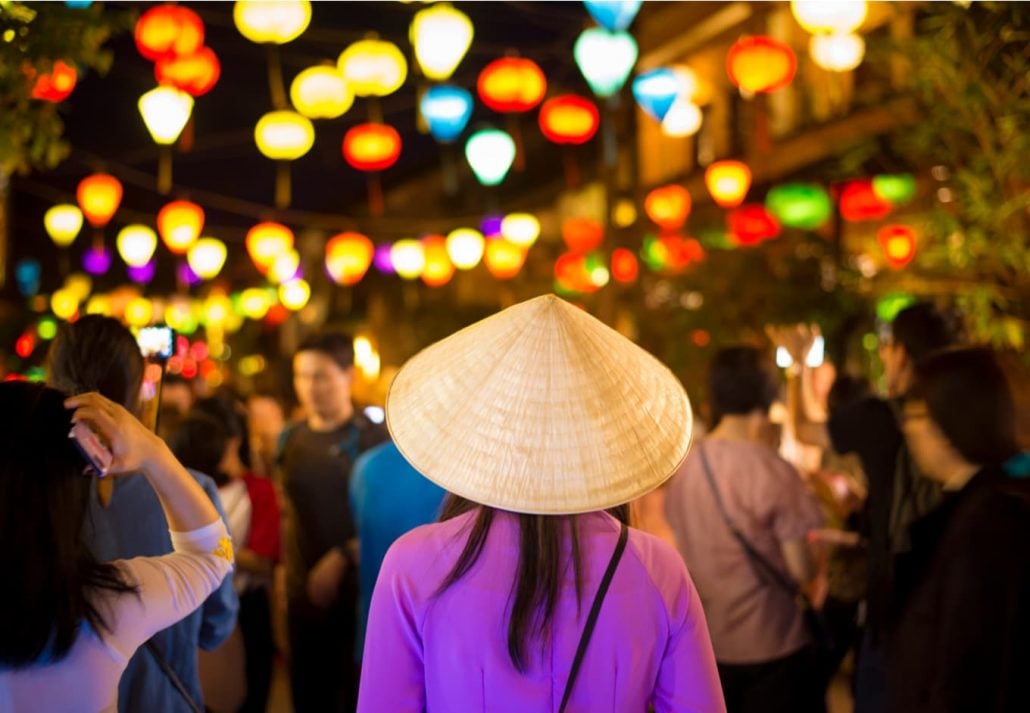 Young woman exploring the Hoi An Night Market, in Vietnam.