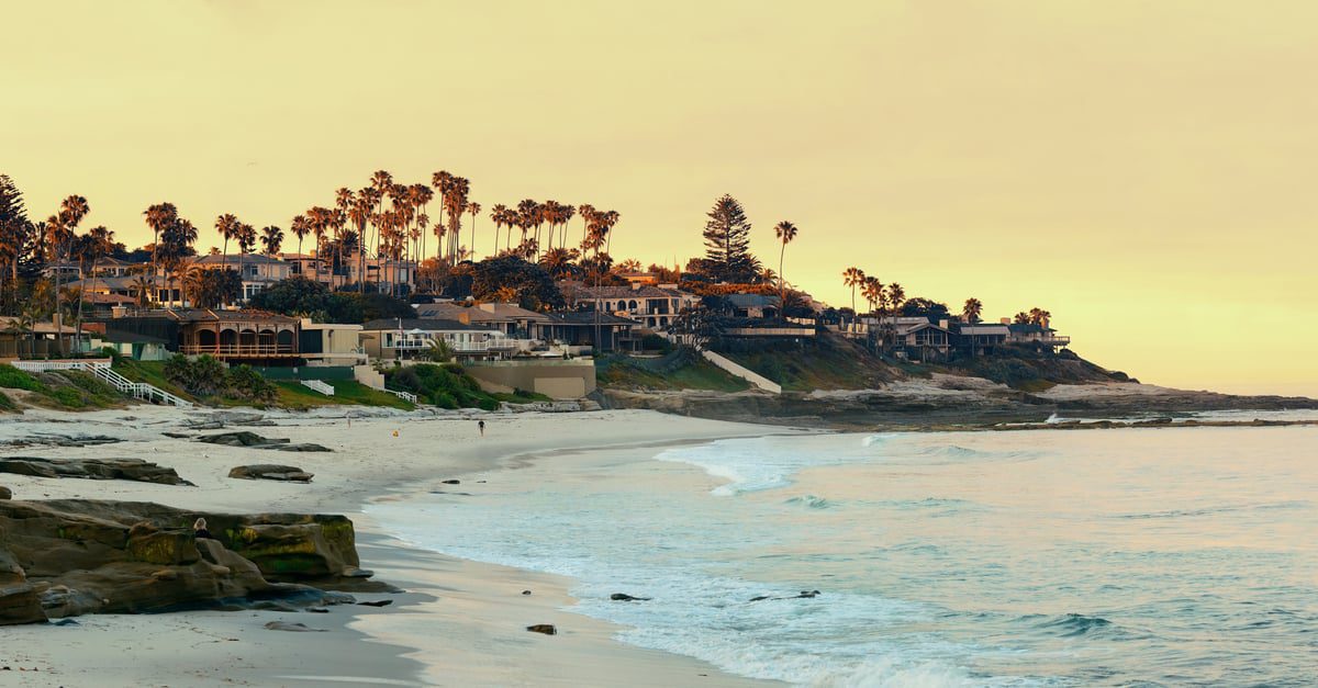 The La Jolla Beach during a yellow sunset, in California.