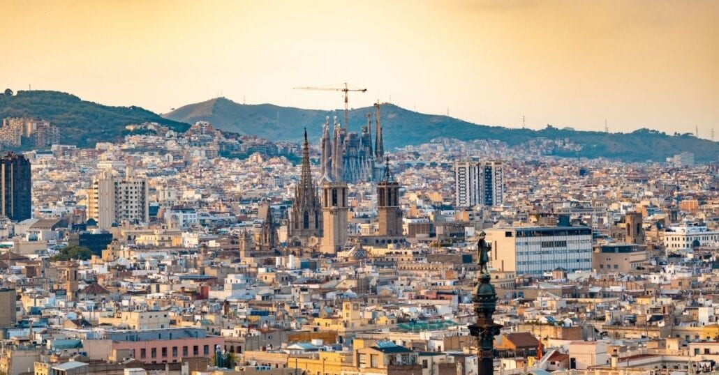 La Sagrada Família surrounded by buildings in Barcelona.