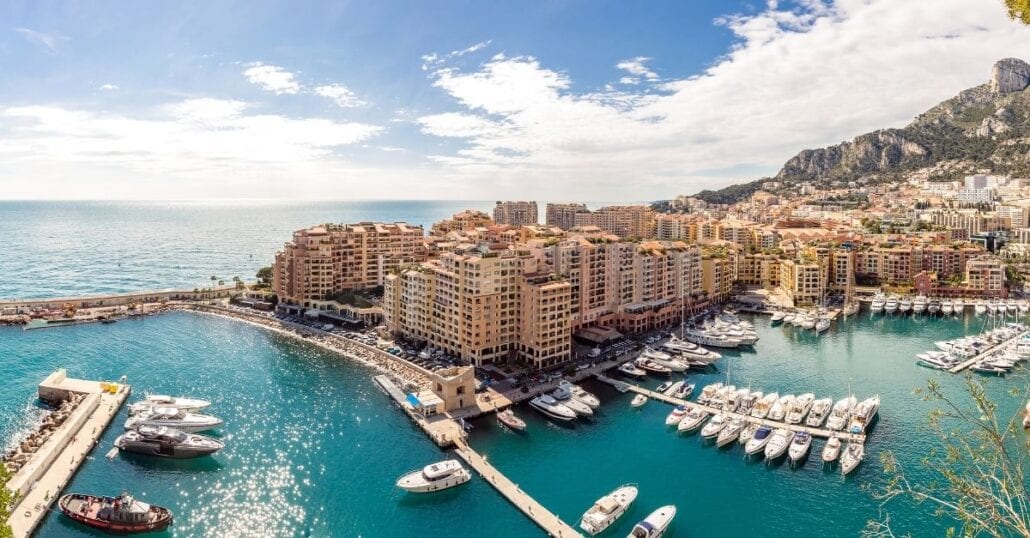 Aerial view of buildings by the ocean in Monaco.