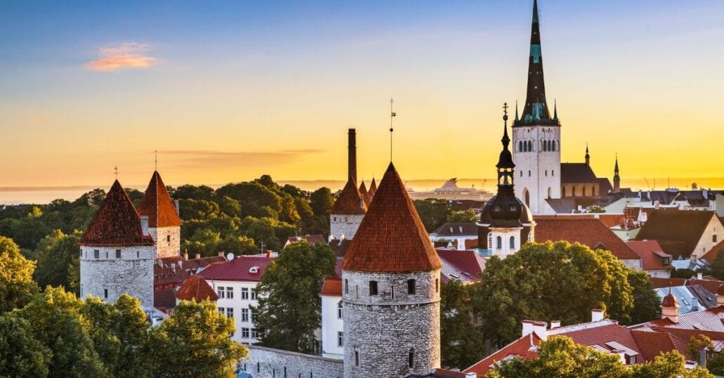 Historic buildings in Tallinn, Estonia, during the sunset.