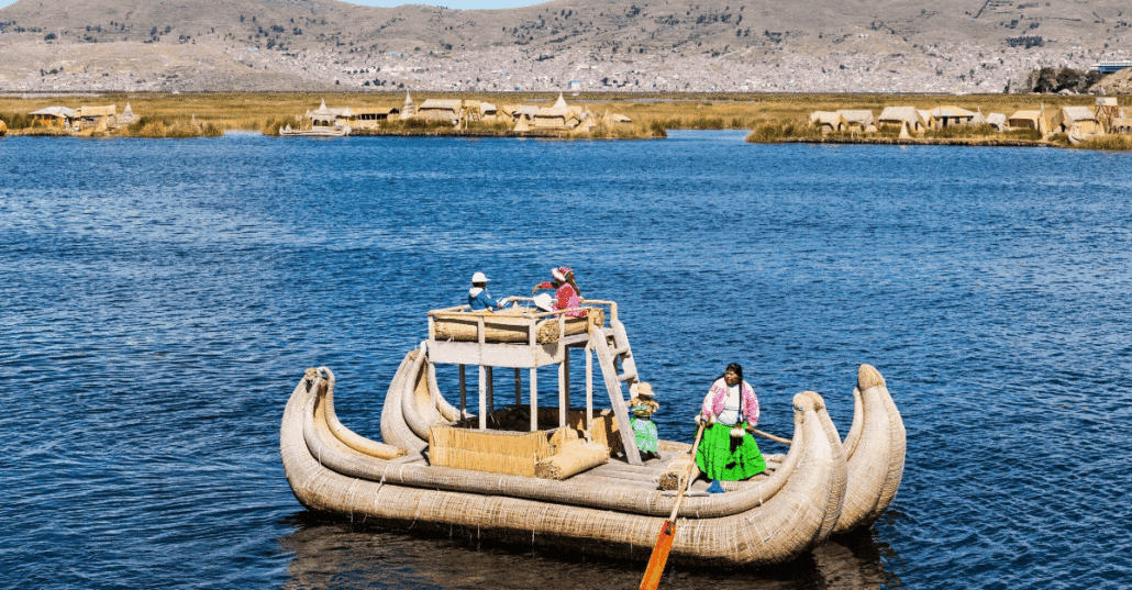 A traditional reed boat on the blue waters of the Lake Titicaca, in Bolivia.