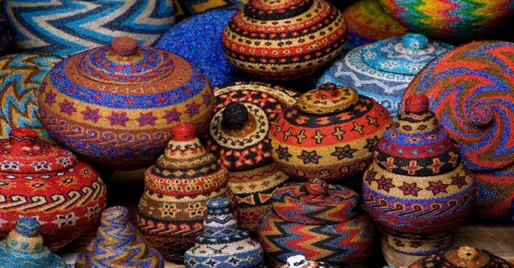 A batch of colourfoul handmade baskets in the Ubud Art Market, in Bali.
