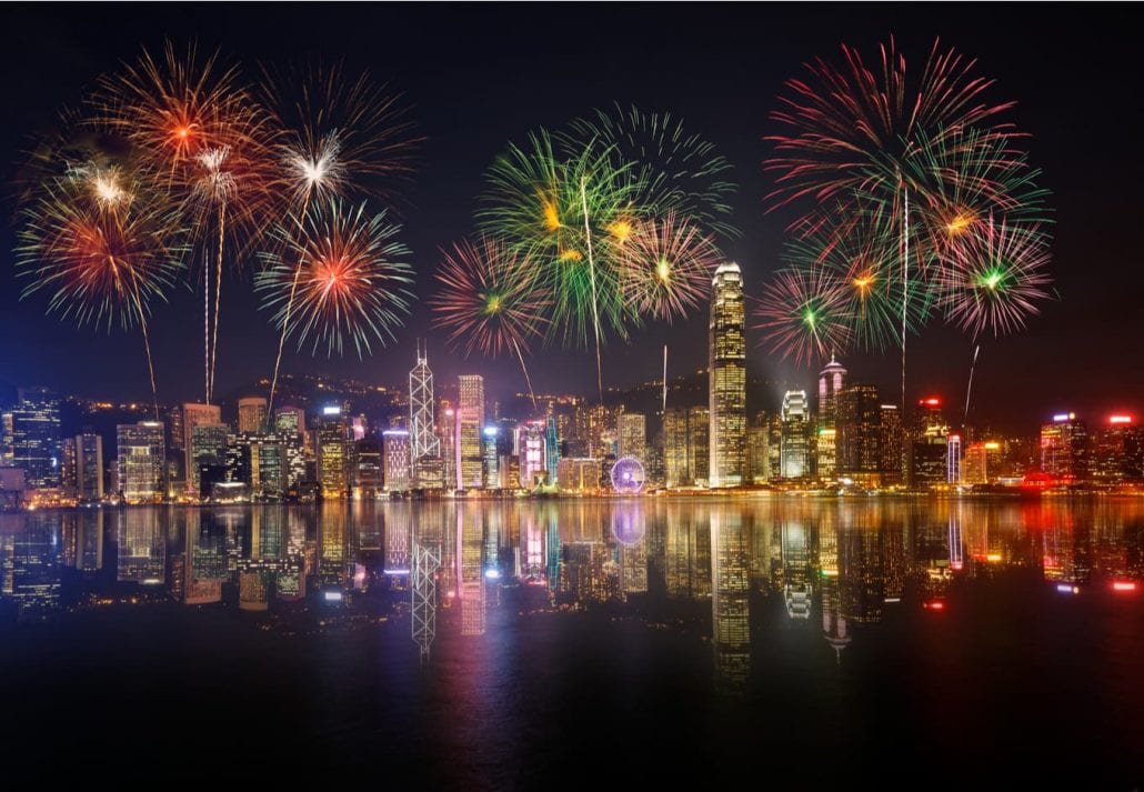 Night view and fireworks in Victoria Harbour, Hong Kong.