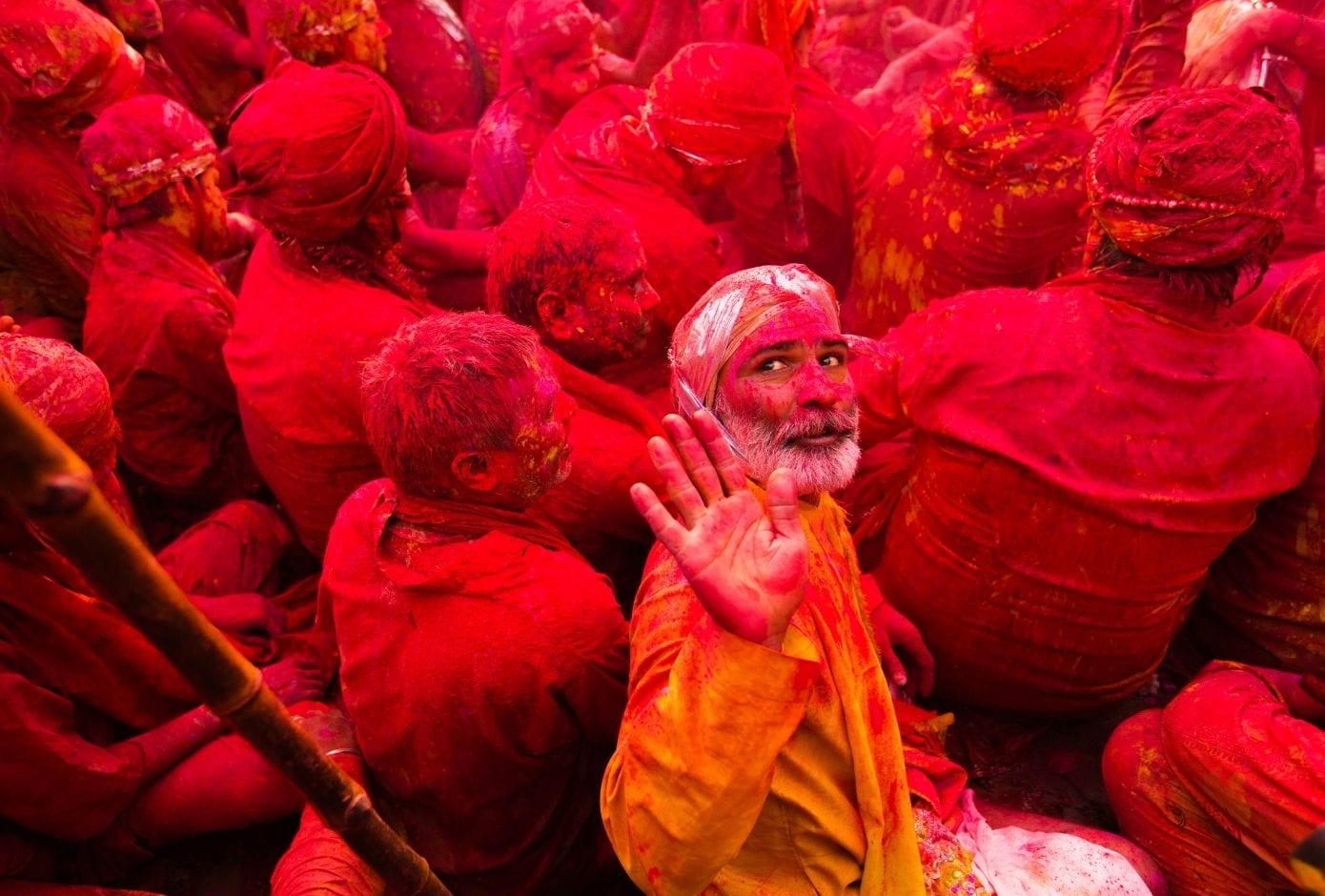 holi travel guide color play red man in india