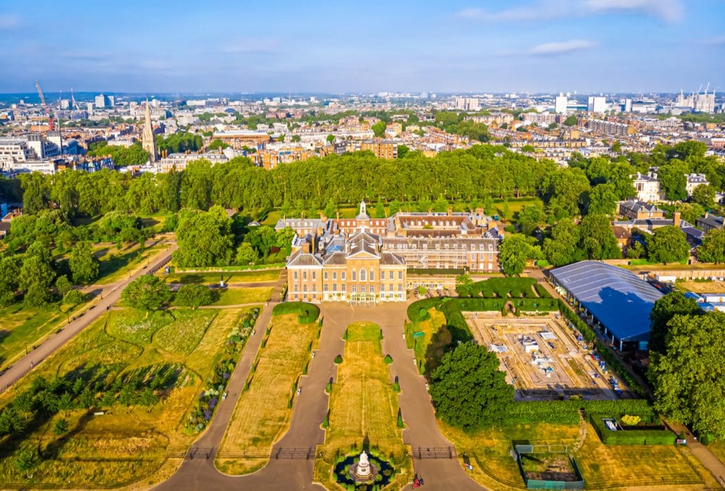 The Kensington Palace and its ornate gardens viewed from the top.