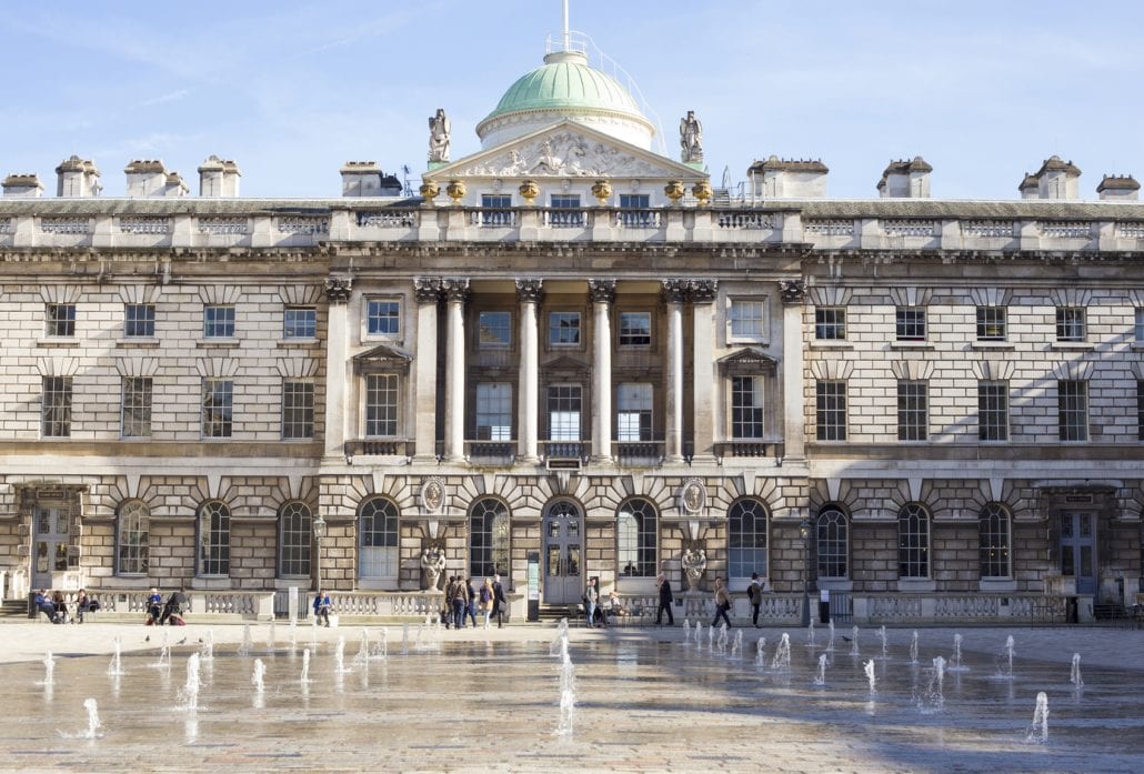 the Somerset House and its dancing spurting water fountains in London, UK on a sunny day.