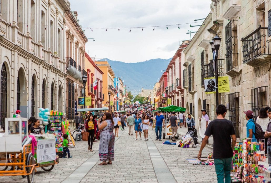 The colorful street life in the colonial city center of Oaxaca, Mexico.