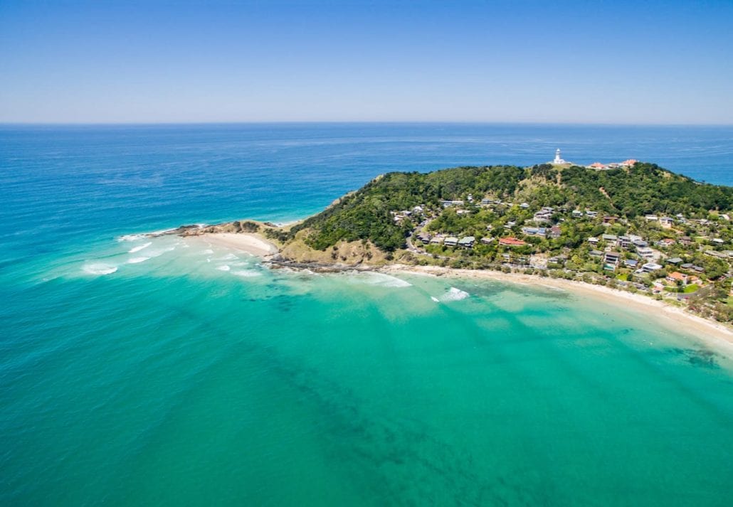 Aerial view of Wategoes beach in Byron Bay with lighthouse