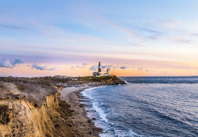 Atlantic ocean waves on the beach at Montauk Point Light, Lighthouse, Long Island, New York, Suffolk County