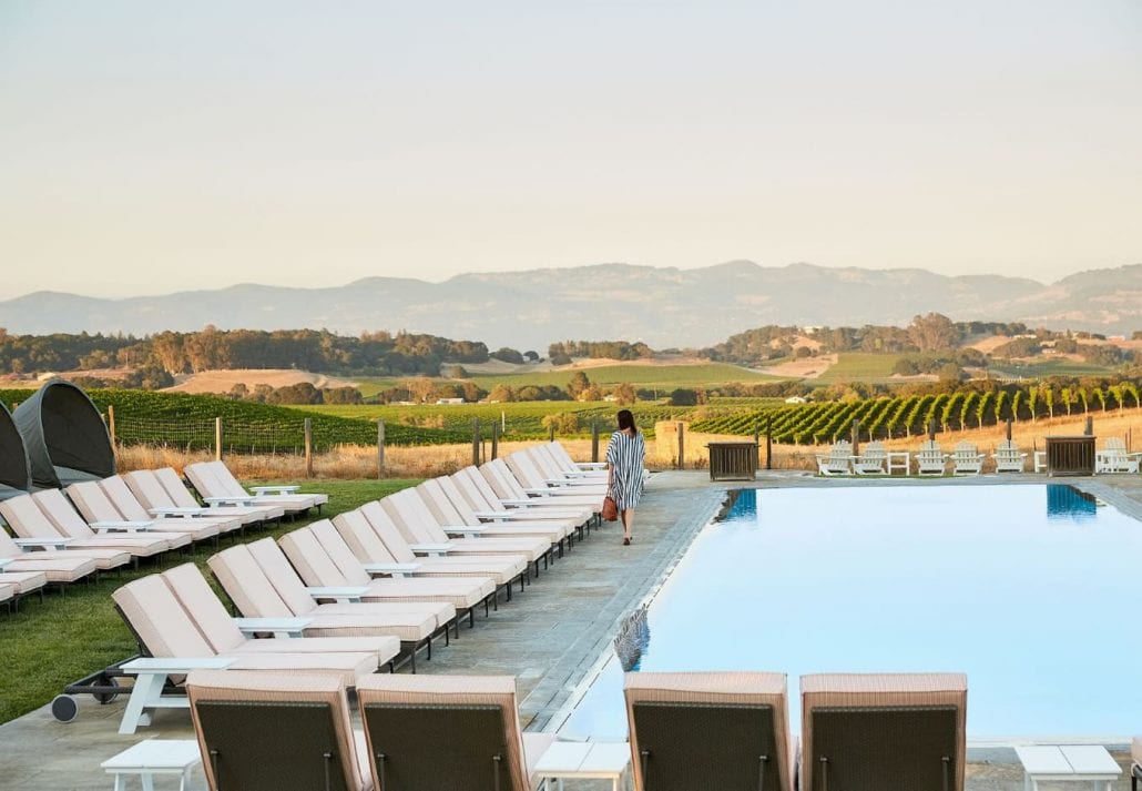 The swimming pool surrounded by vineyards at Carnerors Resort, in Sonoma, California.