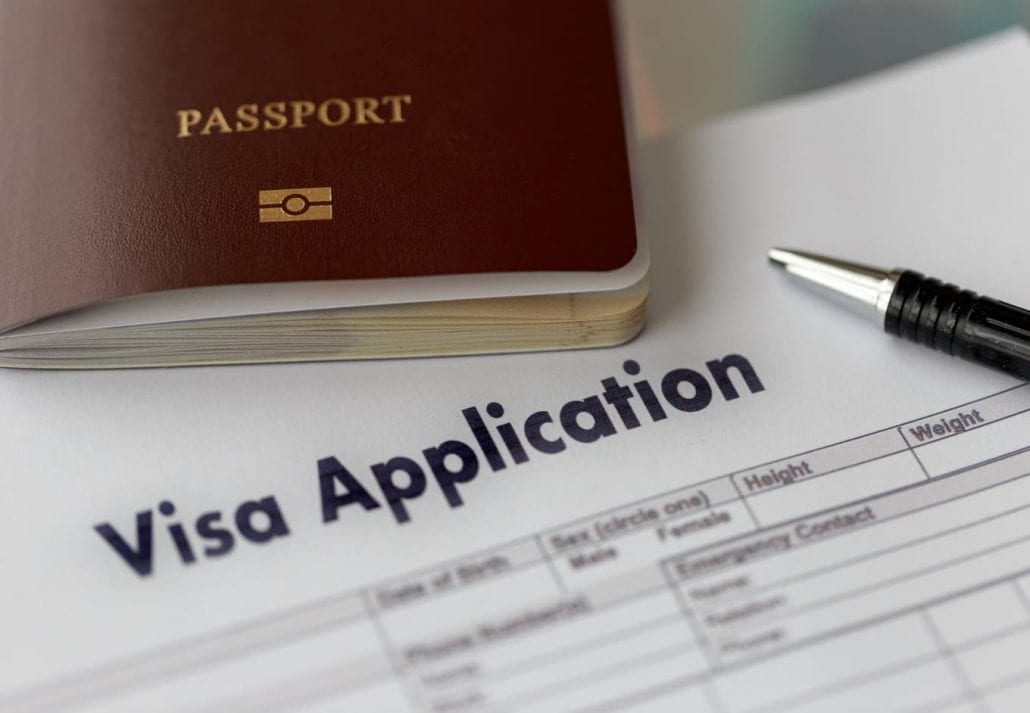 Visa aplication form and a passport.