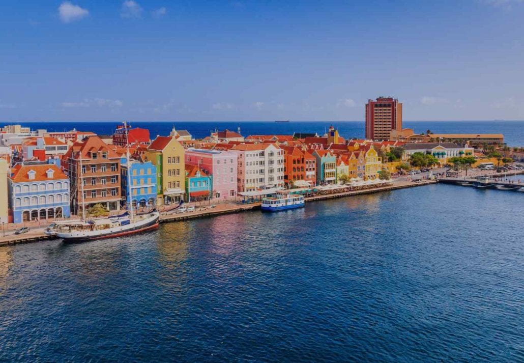 Colorful houses by the ocean in Wiillemstad, Curaçao.