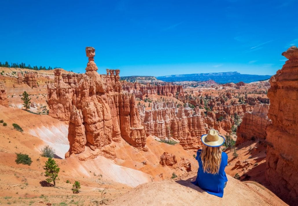 A young woman travels Bryce Canyon national park in Utah, United States.