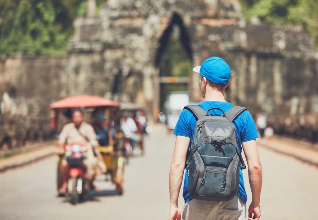 Young tourist walking in Siem Reap, Cambodia.