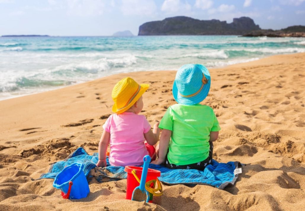Toddlers on a sandy beach