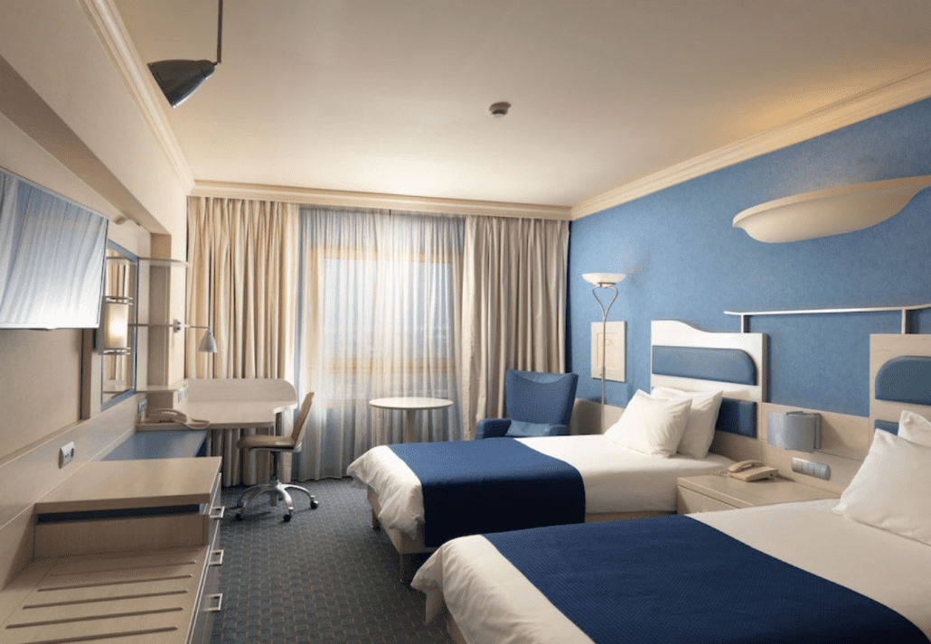 A blue and sky themed hotel room