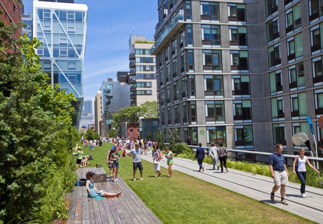 People In NYC's High Line Park during the summer.