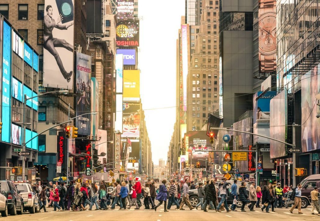 People crossing 7th Avenue in New York.