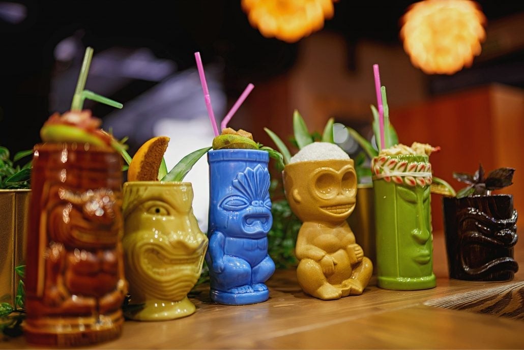 Tiki glasses at a bar