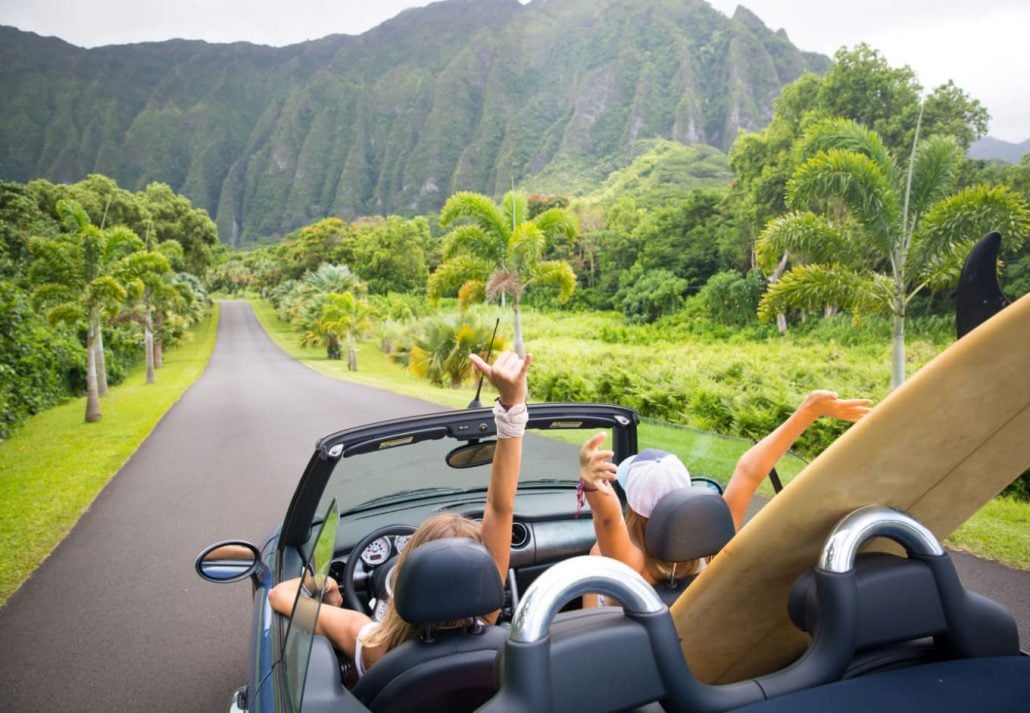 Friends driving in Hawaii.