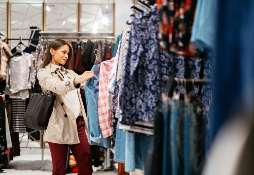 a woman shopping for clothes