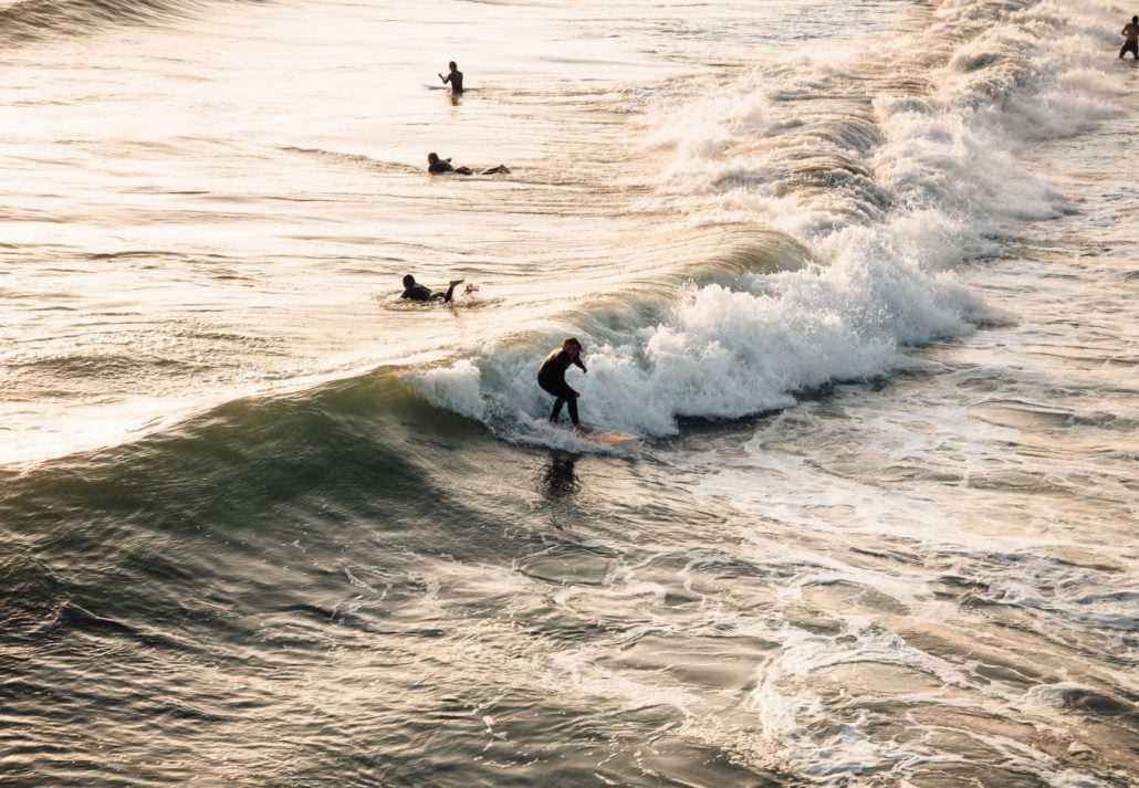 People surfing on Huntington City Beach, Huntington Beach.