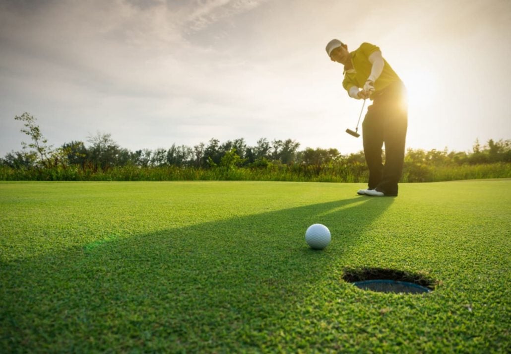 A man golfing.