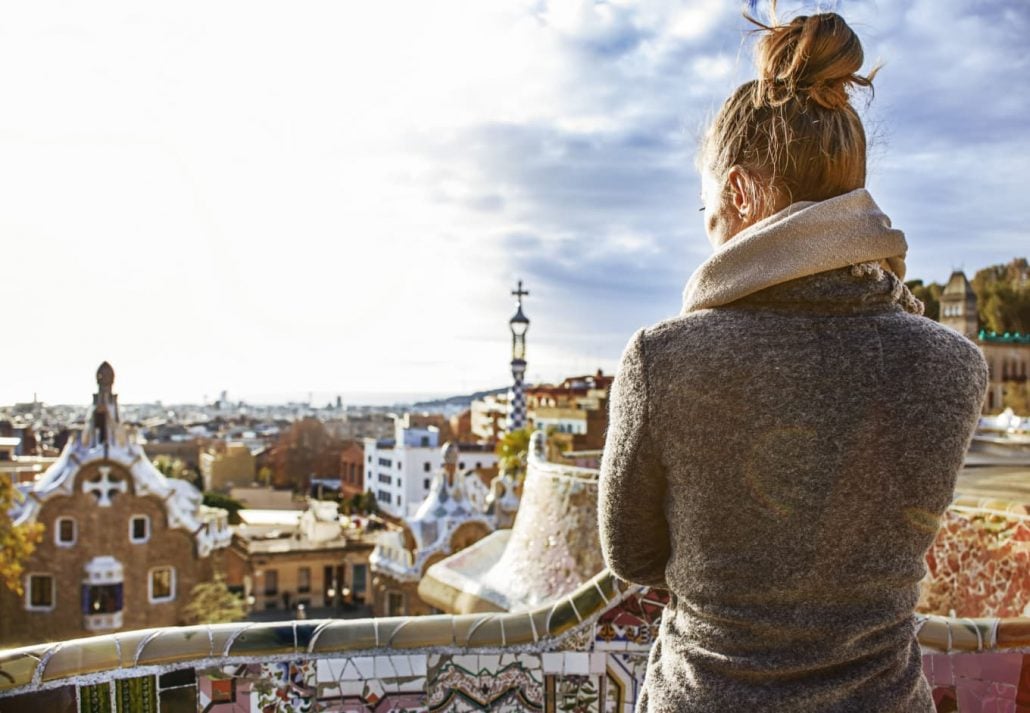 A woman in Park Güell, Barcelona, during the winter.