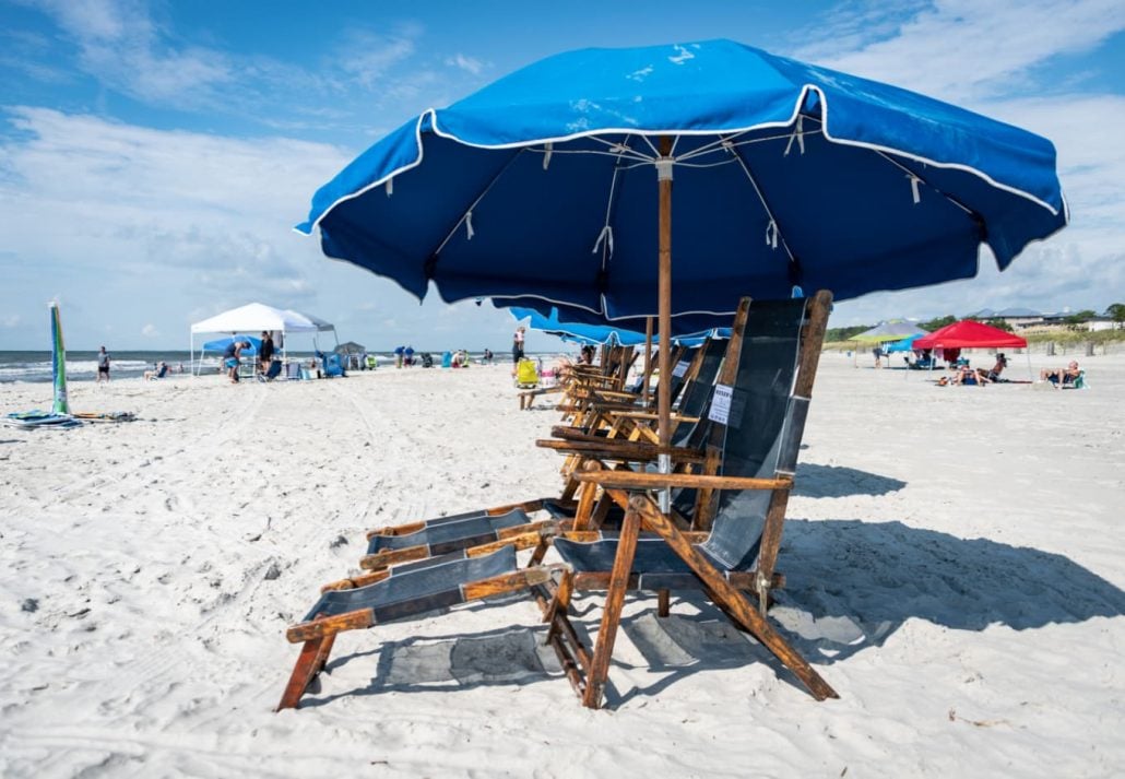 beach chairs with sun umbrellas at Coligny Beach Park